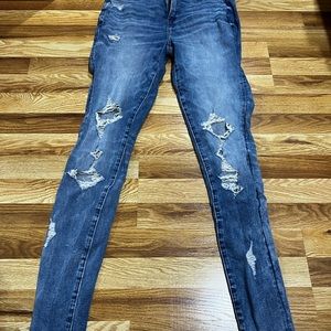 Like new, worn once American Eagle ripped jeans, size 4 but fit a little big